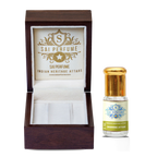Applying authentic Jasmine Attar perfume oil to the wrist, highlighting the rich, long-lasting hydro-distilled fragrance with a natural sandalwood base.