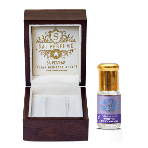 Elegant application of Sai Perfume's Boronia Absolute, highlighting its highly complex, fruity, woody, and violet-like aroma prized by master perfumers.