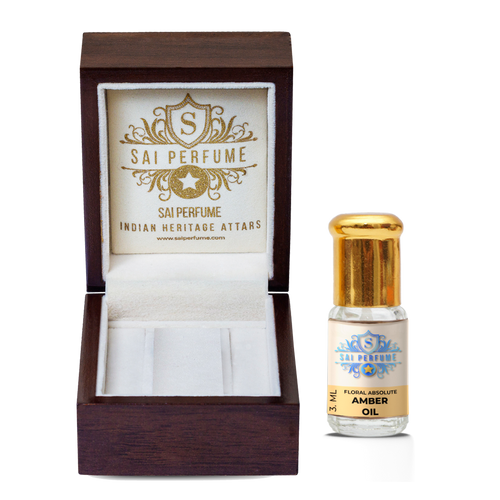 Elegant application of Sai Perfume's Amber Absolute oil, highlighting its rich, warm, and spicy aroma that acts as a perfect base note.