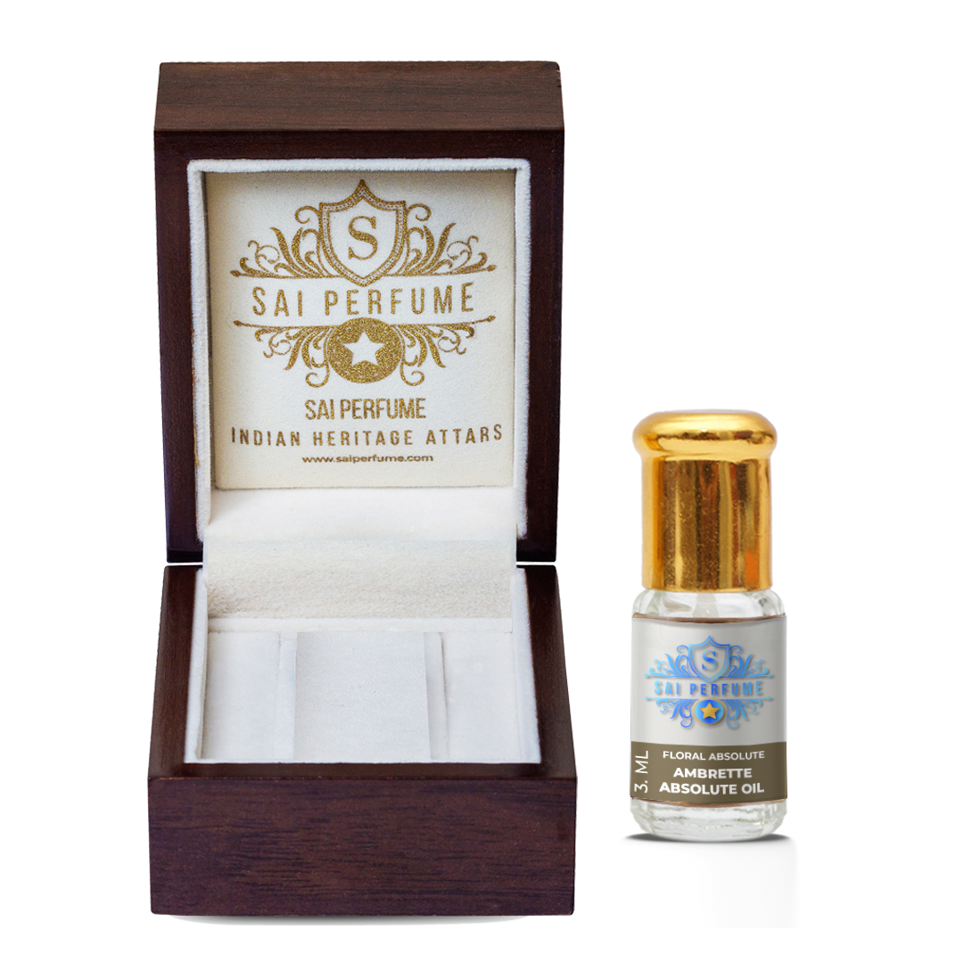 Elegant application of Sai Perfume's Ambrette Absolute Oil, highlighting its rich, nutty, and sweet musky-floral aroma that acts as a cruelty-free perfume base.