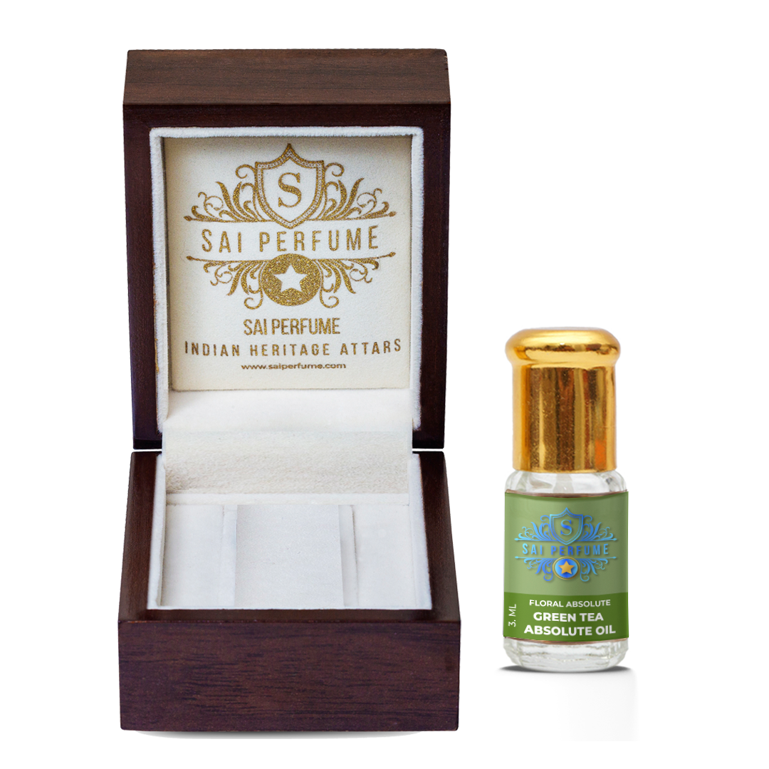 A wellness expert formulating a clean, calming aromatherapy blend using natural Green Tea Absolute Oil in a serene, modern spa environment.