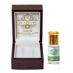 Applying alcohol-free Gul Henna Attar perfume oil to the skin, highlighting its rich, sweet floral and warm spicy natural fragrance notes.