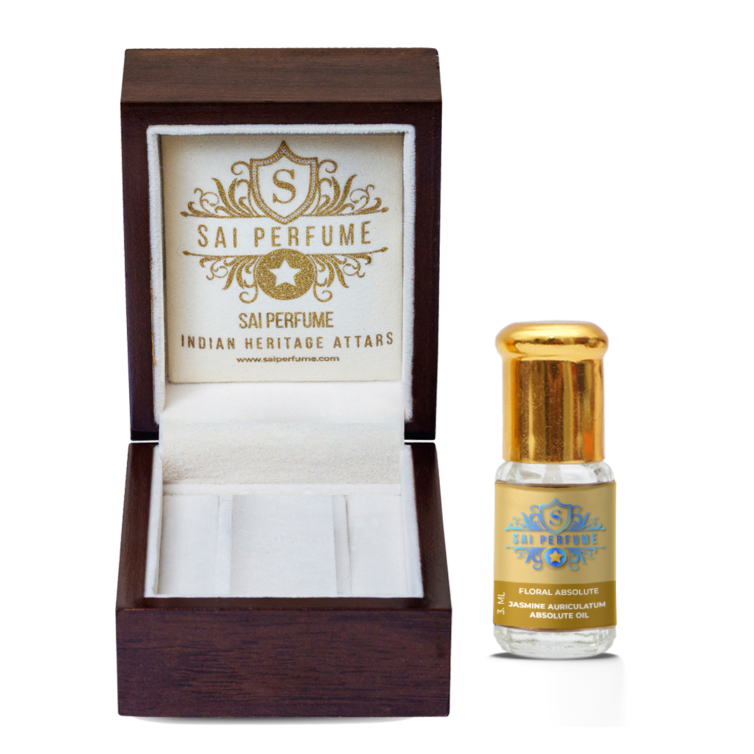 A skilled artisan creating an exotic, sensual perfume blend using rich, honeyed Jasmine Auriculatum absolute on a dark wooden perfumer's desk.