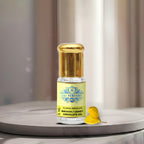 A luxury glass bottle of 100% Pure Broom (Genet) Absolute Oil by Sai Perfume, showcasing the highly prized, golden honey-scented botanical extract.