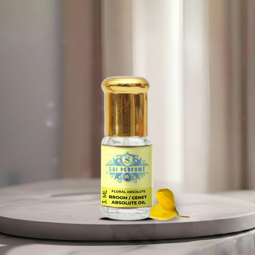 A luxury glass bottle of 100% Pure Broom (Genet) Absolute Oil by Sai Perfume, showcasing the highly prized, golden honey-scented botanical extract.