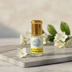 Bottle of pure Mogra Attar, a 100 percent natural and alcohol-free Sambac Jasmine oil perfume by Sai Perfume.