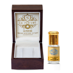A holistic practitioner blending deep, balsamic Myrrh Absolute Oil to create a grounding meditation and sacred ritual fragrance.